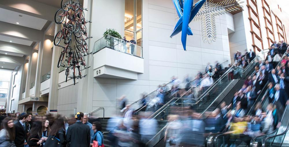 Attendees walking through Walter E Washington Convention Center