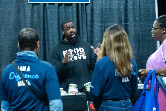 A representative of the CareFirst addressing community members