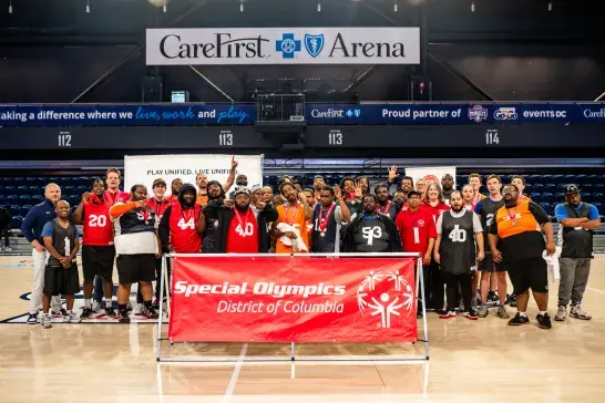 Athletes posing for a group picture