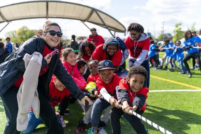 Kids participating in tug of war